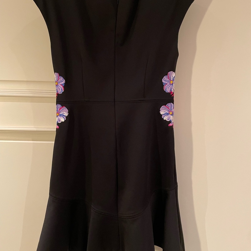 Elegant Black Dress with Floral Accents